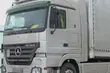 W czasie jazdy tirem pijany kierowca oglądał film