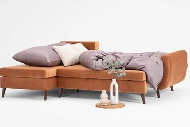 Narożnik czy sofa do salonu - co wybrać?