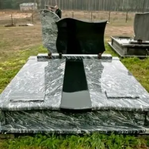 E. i W. Rutkowscy. Nagrobki granitowe
